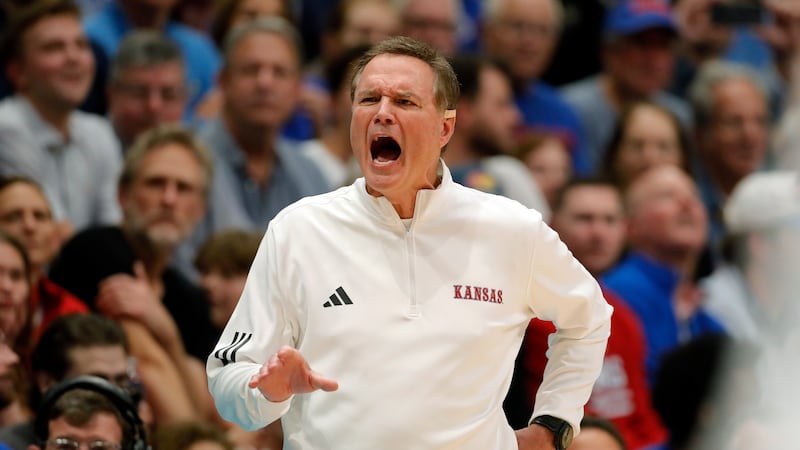 Kansas head coach Bill Self reacts during the second half of an NCAA college basketball game...