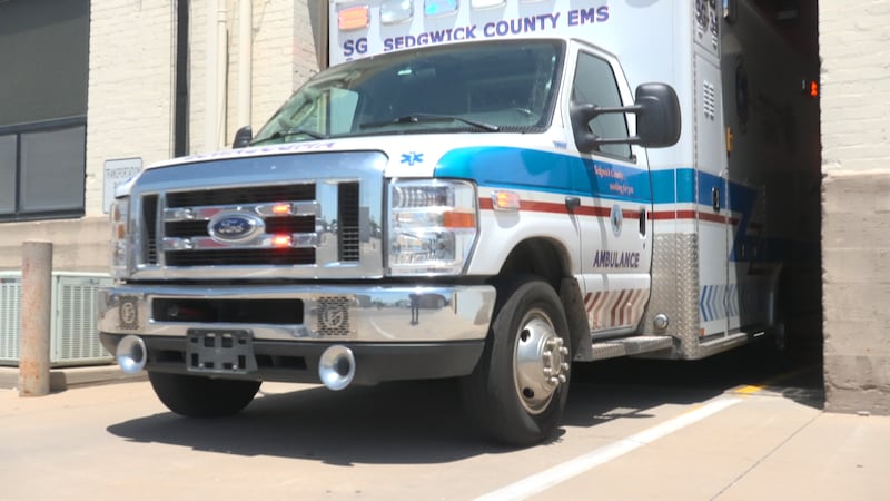 Sedgwick County EMS ambulance pulls of of garage