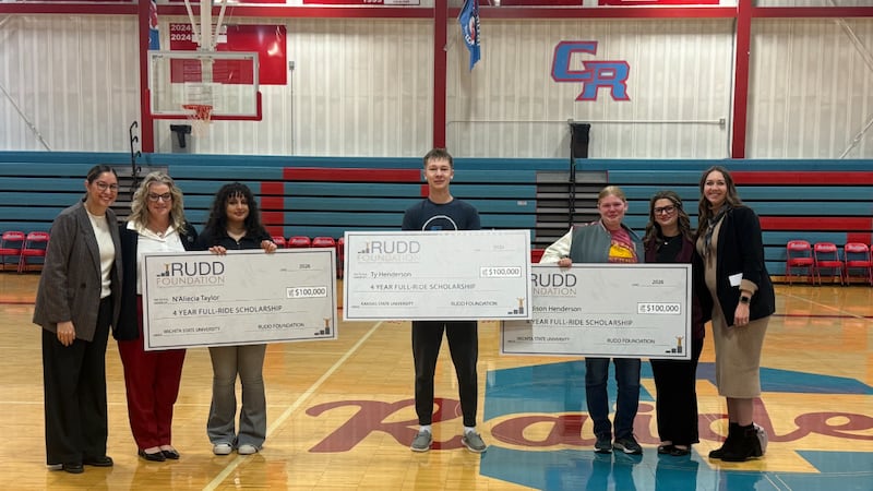 Central, USD 462, celebrates (from left) N'Aliecia Taylor, Ty Henderson and Adison Henderson...