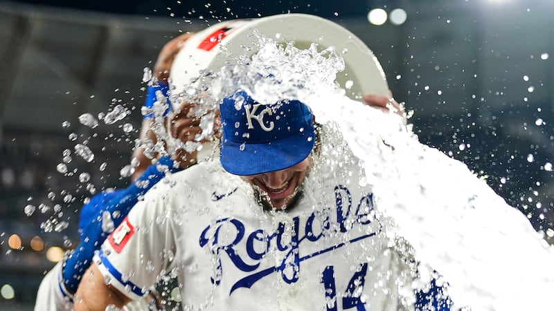 Kansas City Royals' Jac Caglianone is doused by teammates after their baseball game against...