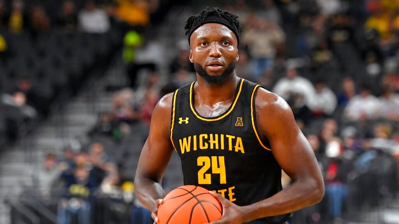 Wichita State forward Morris Udeze looks down court to pass against Arizona during the second...