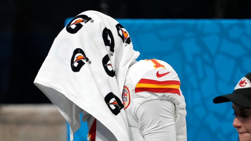Kansas City Chiefs wide receiver Xavier Worthy (1) walks on the sideline during an NFL...