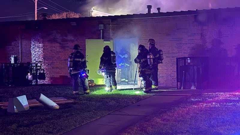 Wichita firefighters battled a fire Wednesday morning at an insurance office in west Wichita.